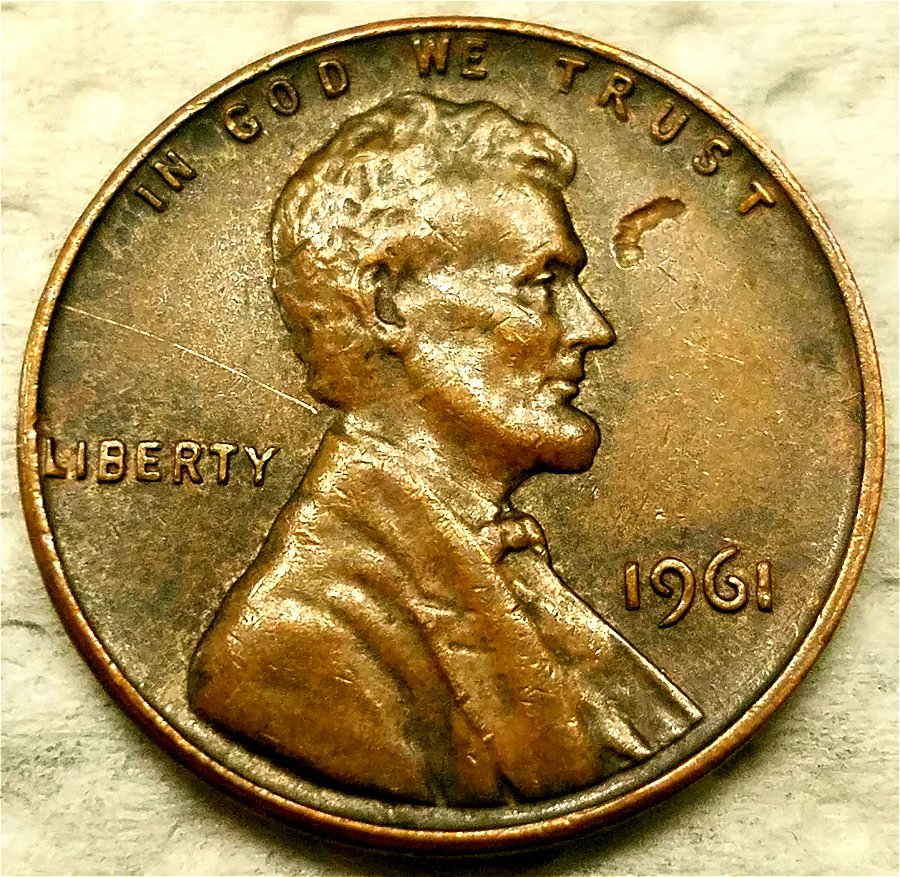1961-P-Lincoln-Cent-Curved-Struck-Through-Or-Lamination-Near-Face?